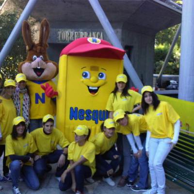 a group of people in yellow shirts