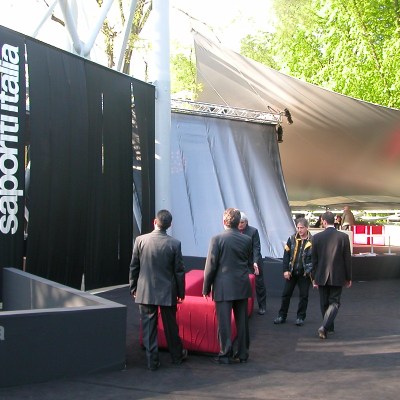 a group of people standing in front of a building