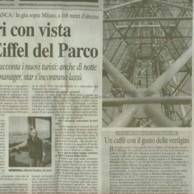 Italian newspaper page with text and an image of a metal tower structure.