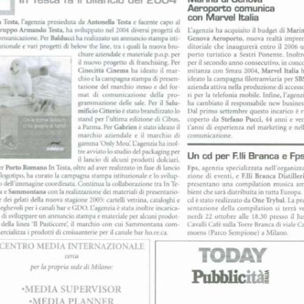 Italian newspaper page featuring articles on marketing and advertising.